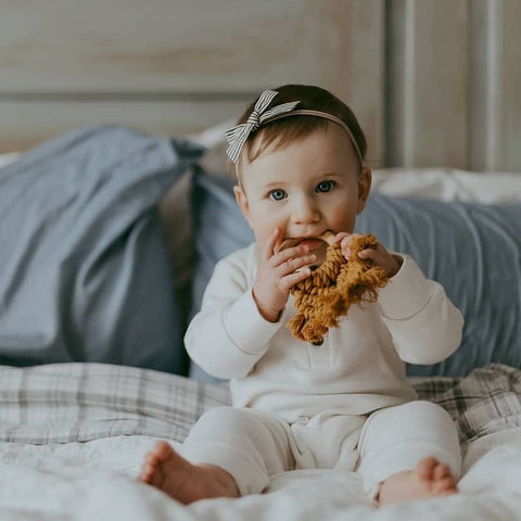 Lucy Lue Organics. Shop our organic baby garment. Organic baby basics. Organic baby products. Knotted gowns. Soft baby clothes. newborn baby clothes.