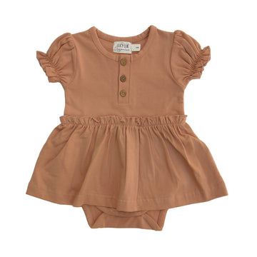 Organic skirted bodysuit. Baby girl dress. Organic baby clothes. Modern baby lcothes. Lucy Lue Organics. button dress for baby girl. Vintage baby girl clothes