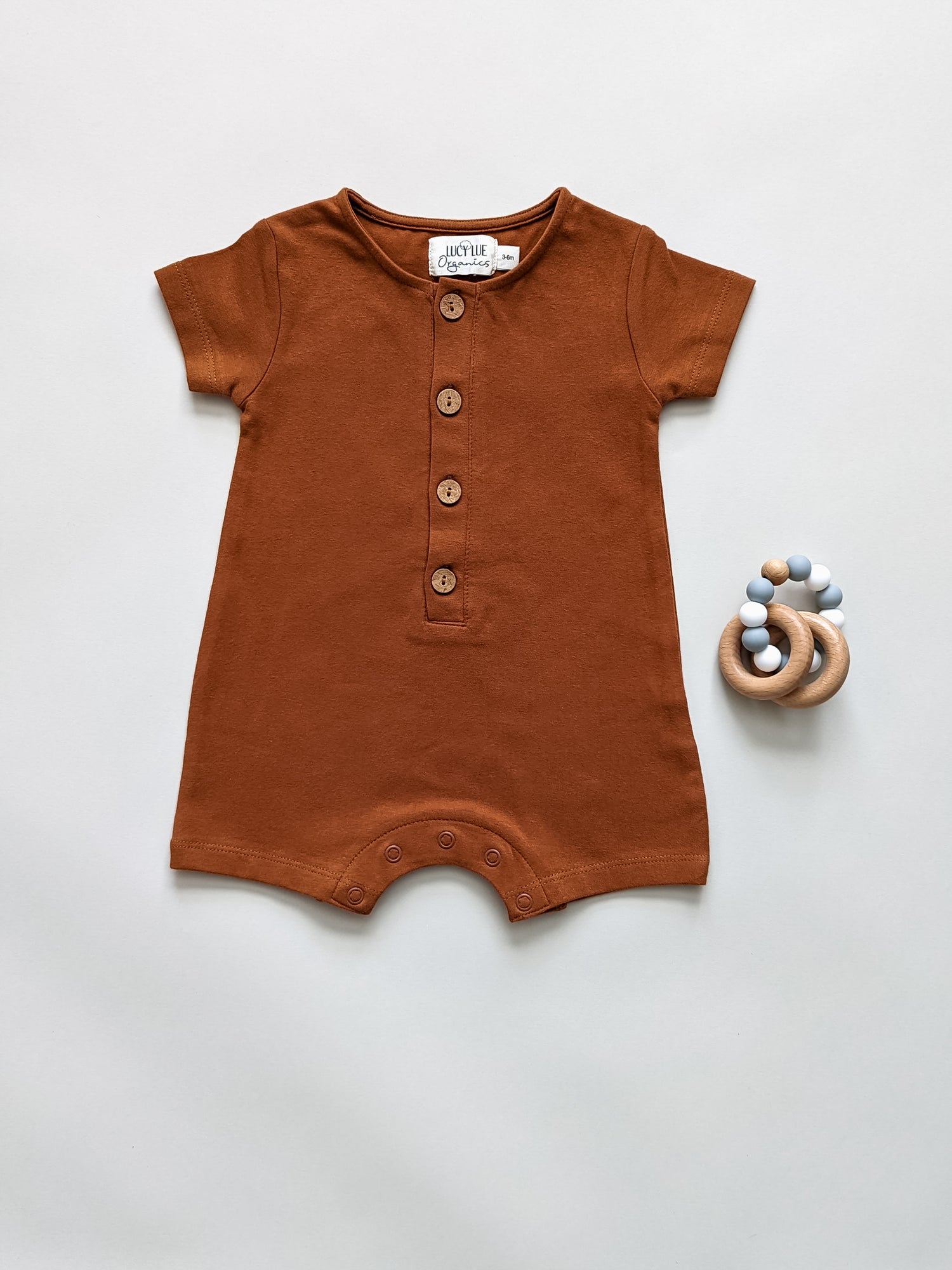 Organic short baby romper, organic baby clothes, baby boy romper, baby girl romper, organic baby shops near me, organic baby clothing brand, ginger baby clothes