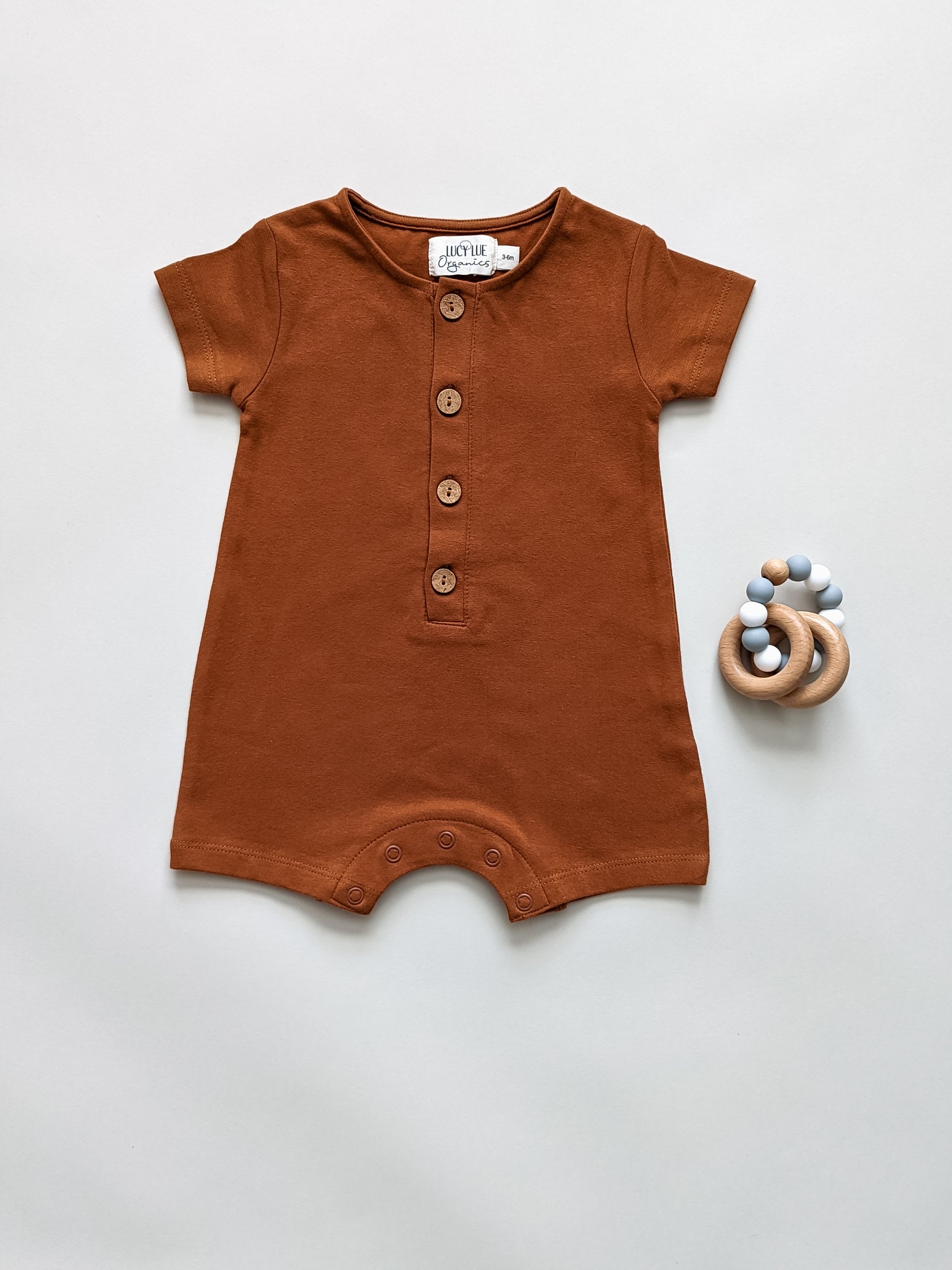 Organic short baby romper, organic baby clothes, baby boy romper, baby girl romper, organic baby shops near me, organic baby clothing brand, ginger baby clothes