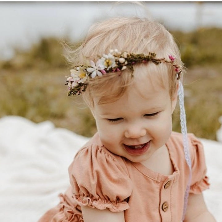 Instagram picture of baby girl first birthday outfit in a vintage baby dress
