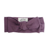 Baby top knot bow by Lucy Lue Organics. Baby girl hair bow. Knotted headband in purple. Organic baby clothes, organic toddler clothes, organic cotton, organic baby, eco friendly clothing, fair trade clothing, baby clothes, modern organic baby clothes, baby boy clothes, baby girl clothes, unisex baby clothes. 