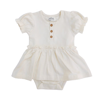 Organic skirted bodysuit. Baby girl dress. Organic baby clothes. Modern baby lcothes. Lucy Lue Organics. button dress for baby girl. Vintage baby girl clothes